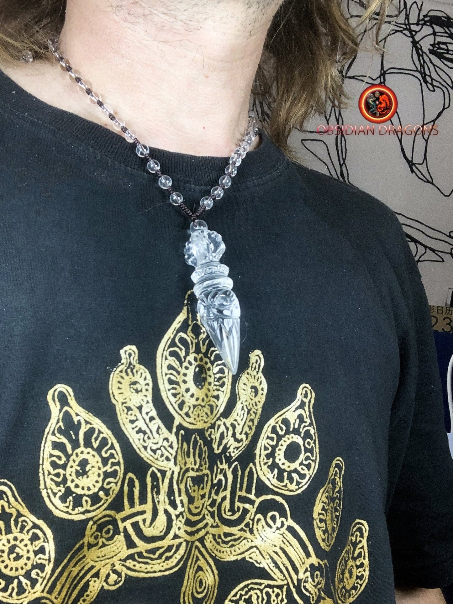 Pendentif phurba en cristal de roche
