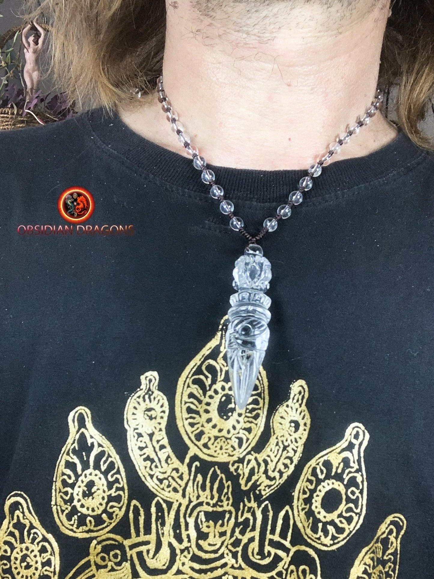 Pendentif phurba en cristal de roche