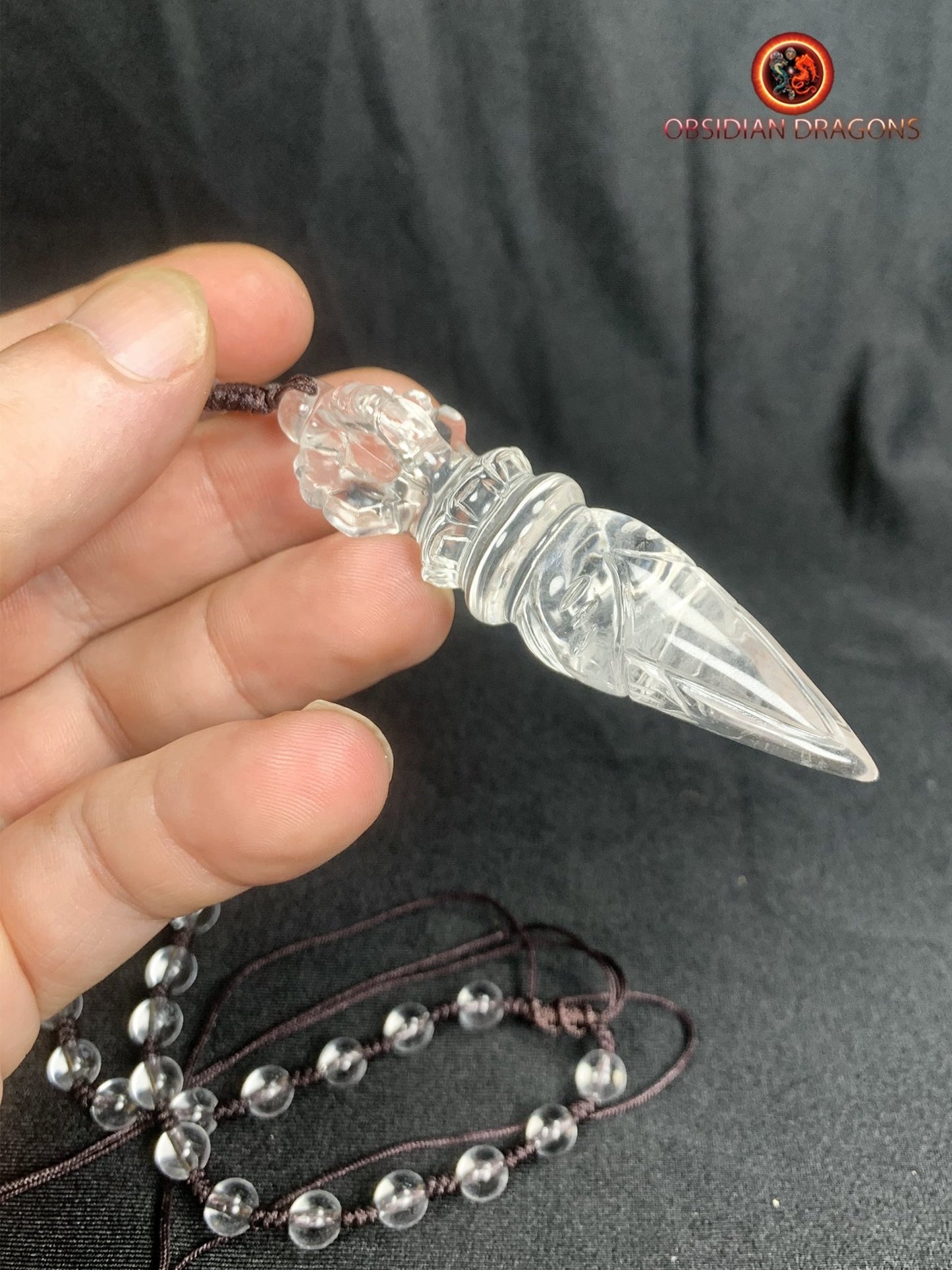 Pendentif phurba en cristal de roche