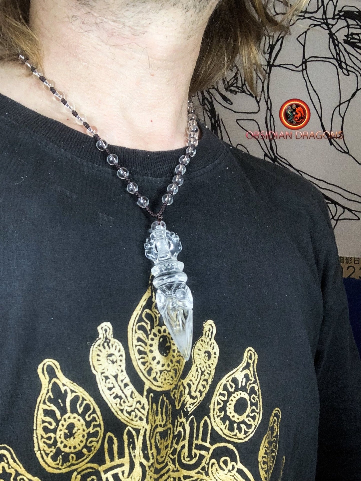 Pendentif phurba en cristal de roche