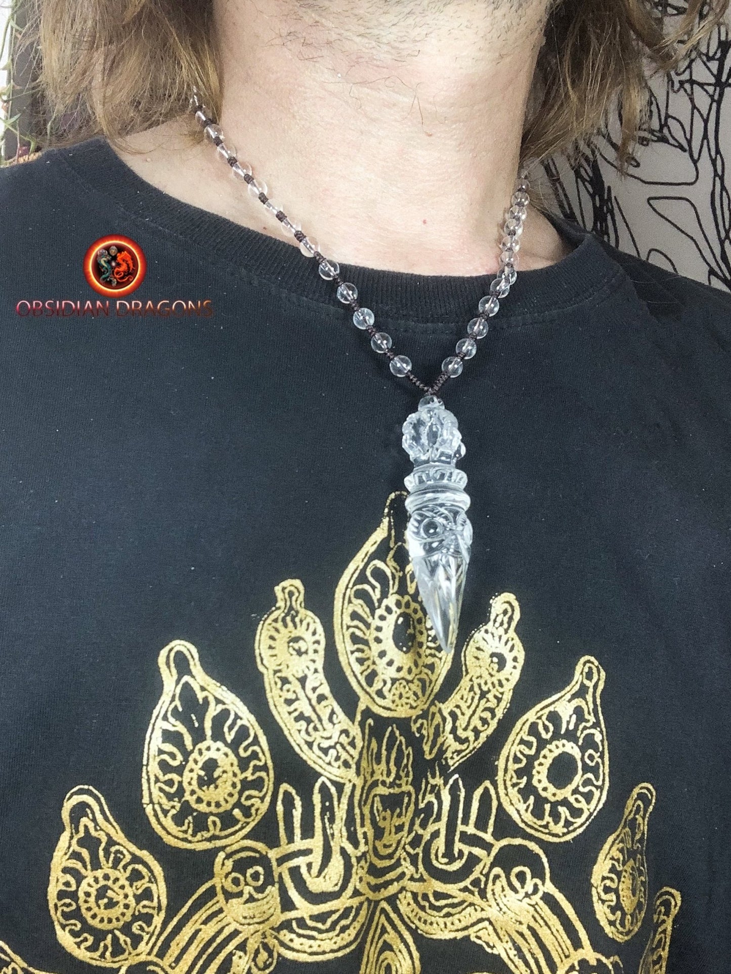 Pendentif phurba en cristal de roche