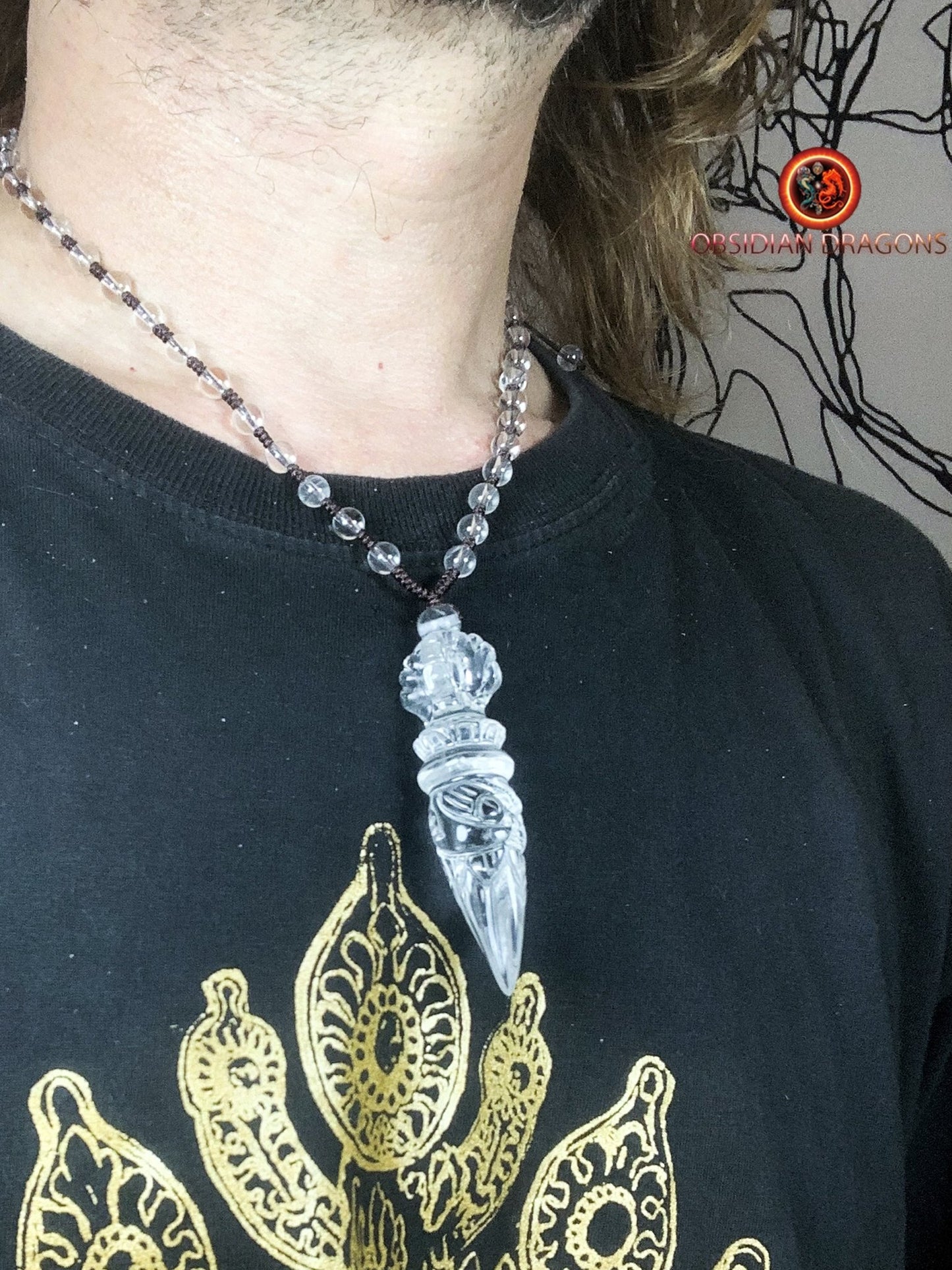 Pendentif phurba en cristal de roche