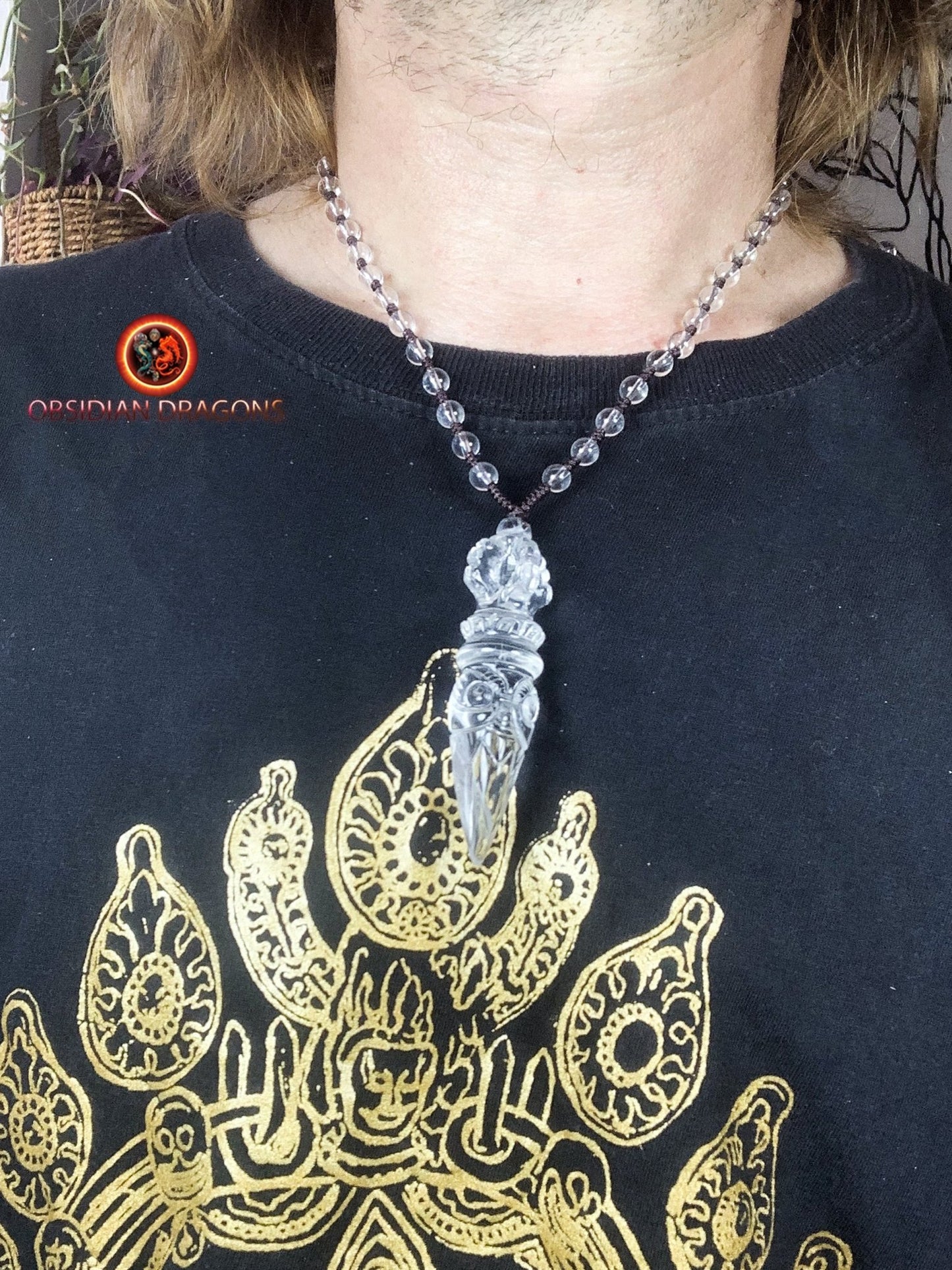 Pendentif phurba en cristal de roche