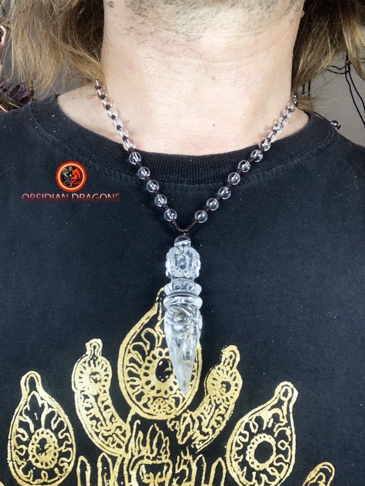 Pendentif phurba en cristal de roche