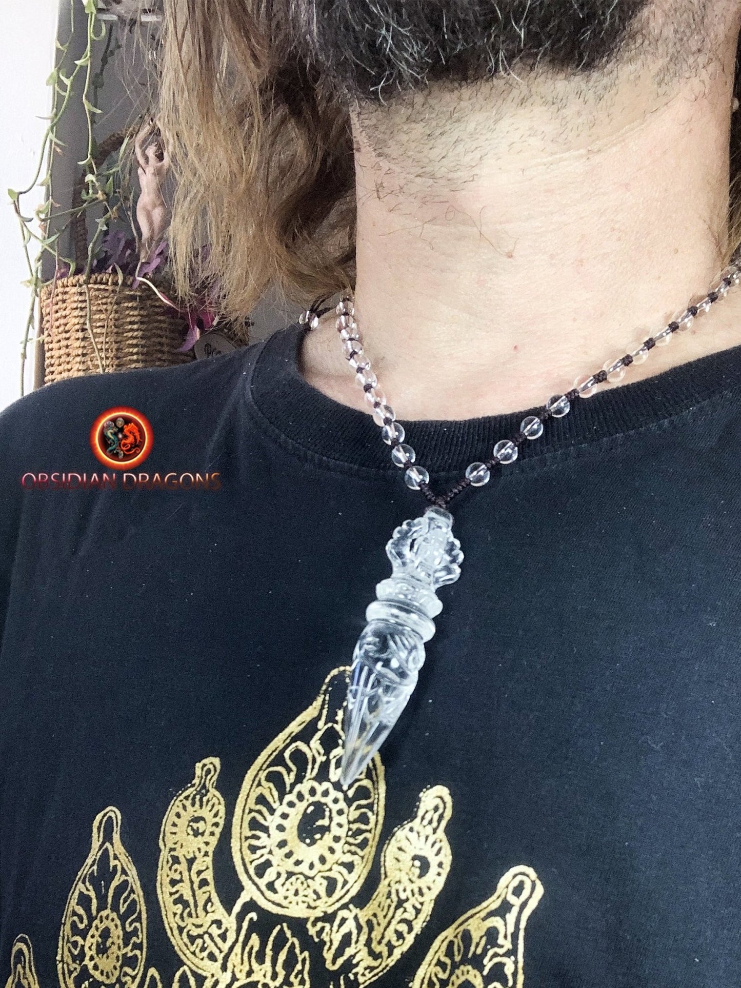 Pendentif phurba en cristal de roche