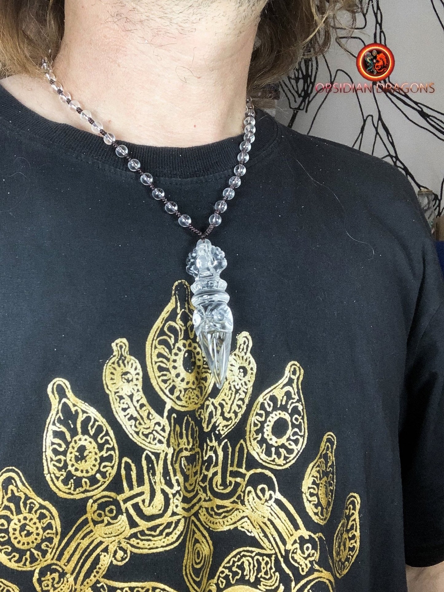 Pendentif phurba en cristal de roche