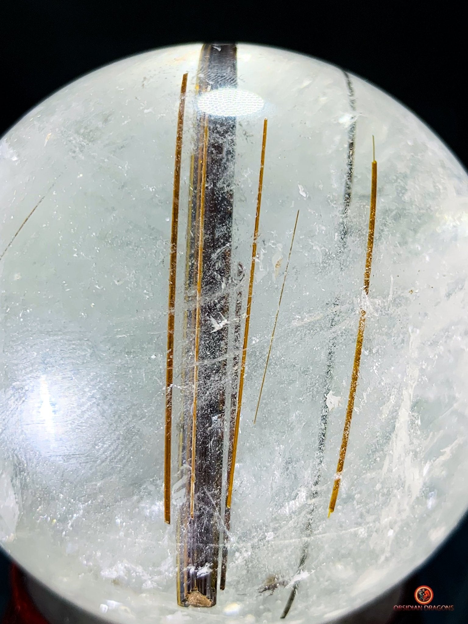 Boule de cristal de roche - inclusions de tourmalines et rutiles | obsidian dragons