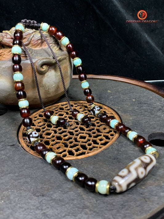 Collier DZI-  Protection tibétaine- DZI à 9 Yeux | obsidian dragons