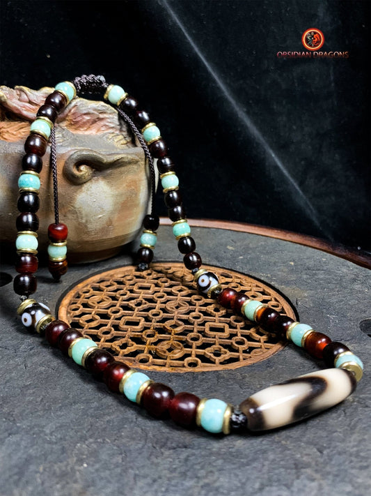 Collier DZI- Amulette tibétaine- DZI à dents de tigre | obsidian dragons