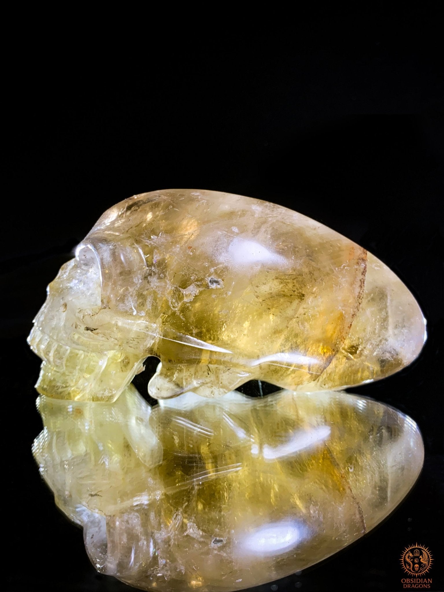 Crâne de Cristal Alien en Quartz Fumé – Reflets Arc-en-Ciel | obsidian dragons