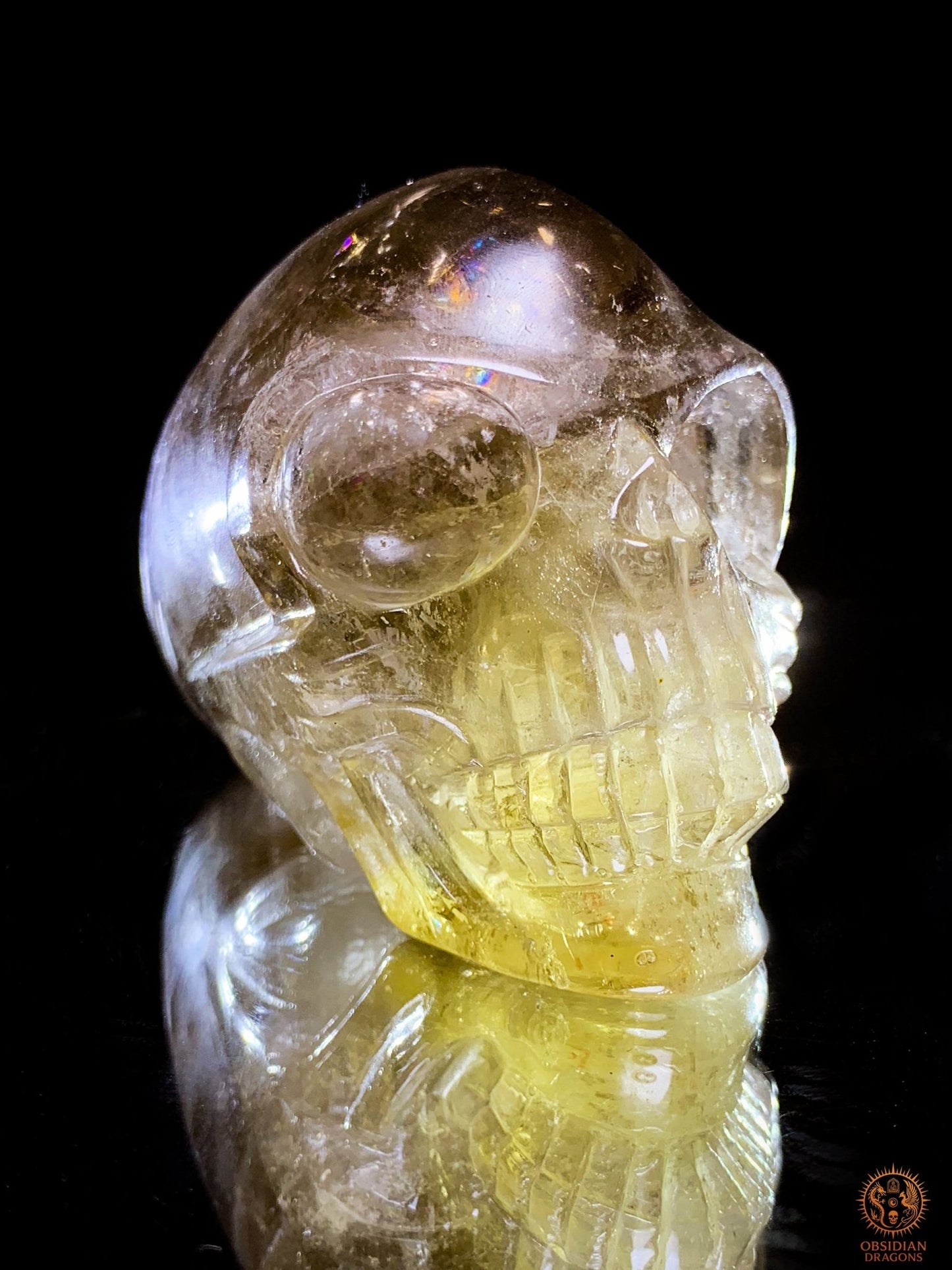 Crâne de Cristal Alien en Quartz Fumé – Reflets Arc-en-Ciel | obsidian dragons