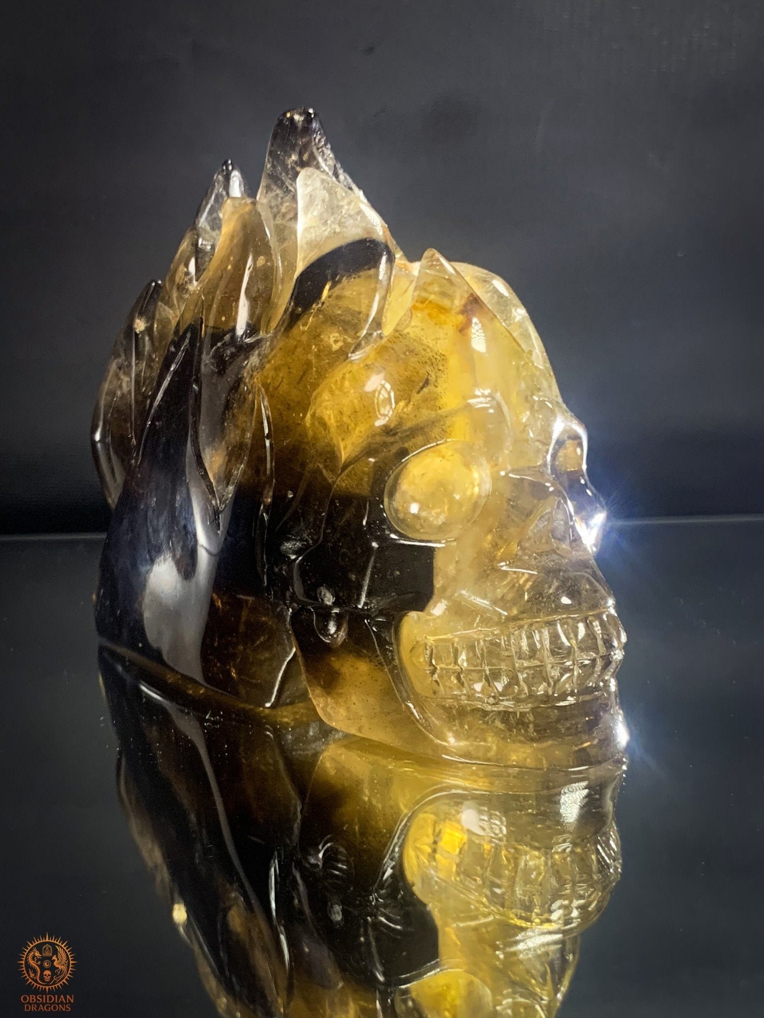 Crâne de Cristal allongé en Quartz Fumé - Crâne enflammé | obsidian dragons