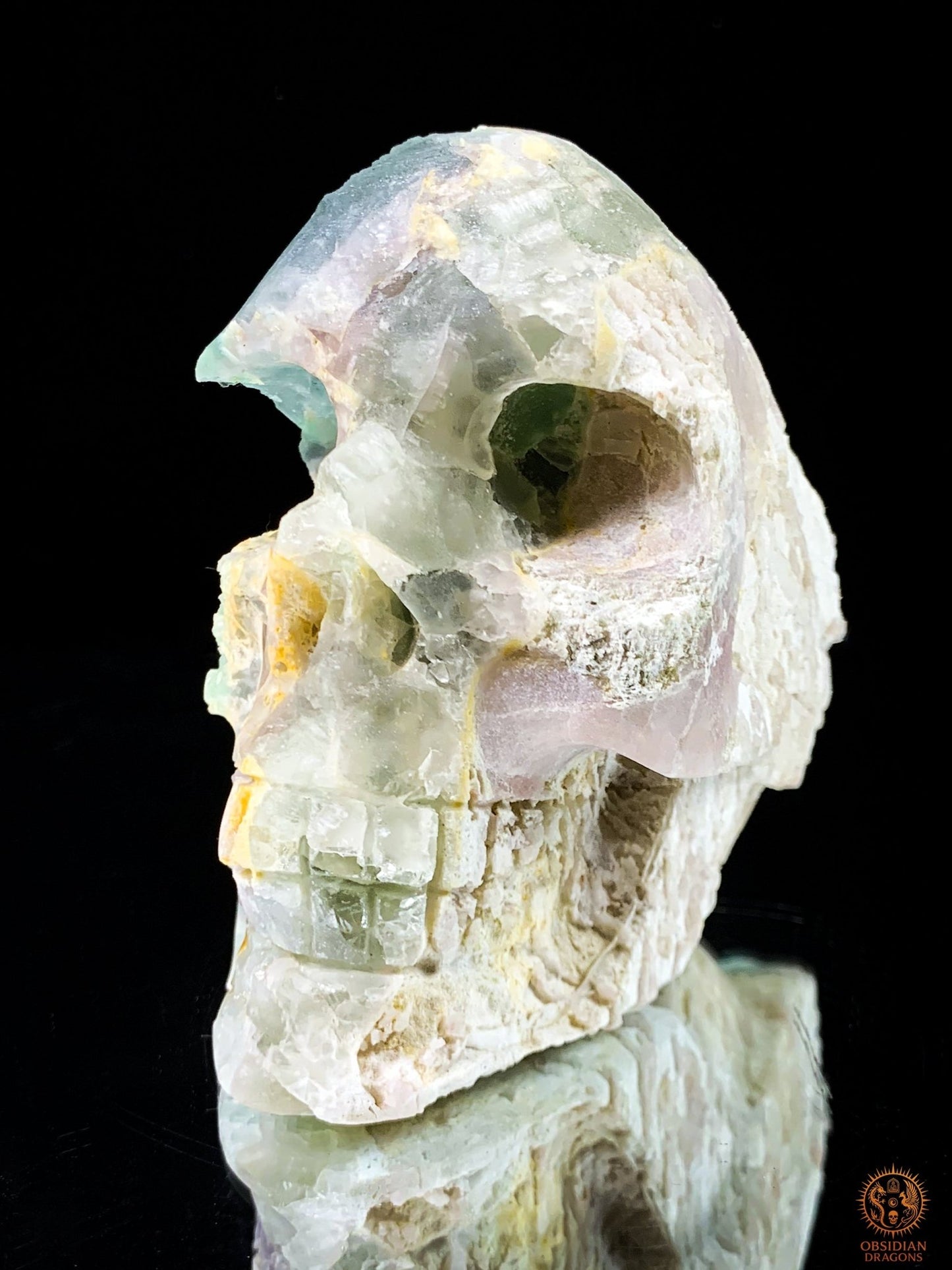Crâne de Cristal en Fluorite Verte Brute – Crâne de cristal ailé | obsidian dragons