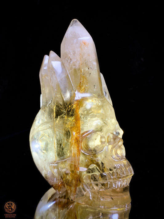 Crâne de Cristal en Quartz Hématoïde – Pointes de Lumière | obsidian dragons
