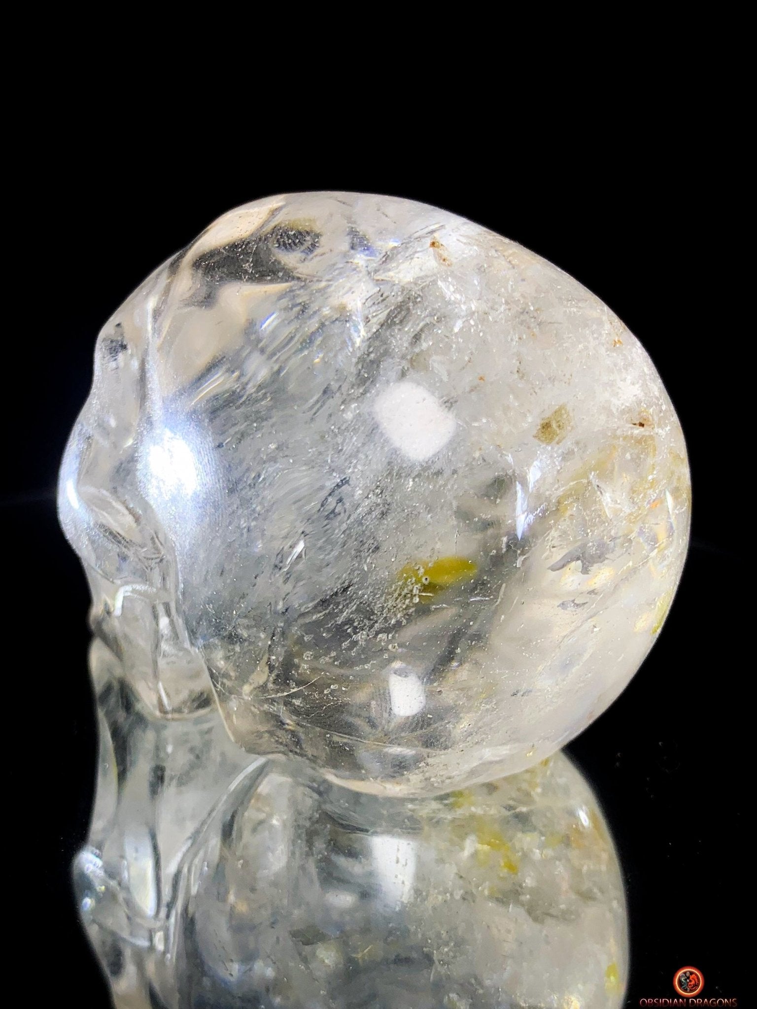 Crâne de Cristal en cristal de roche aux reflets arc-en-ciel | obsidian dragons