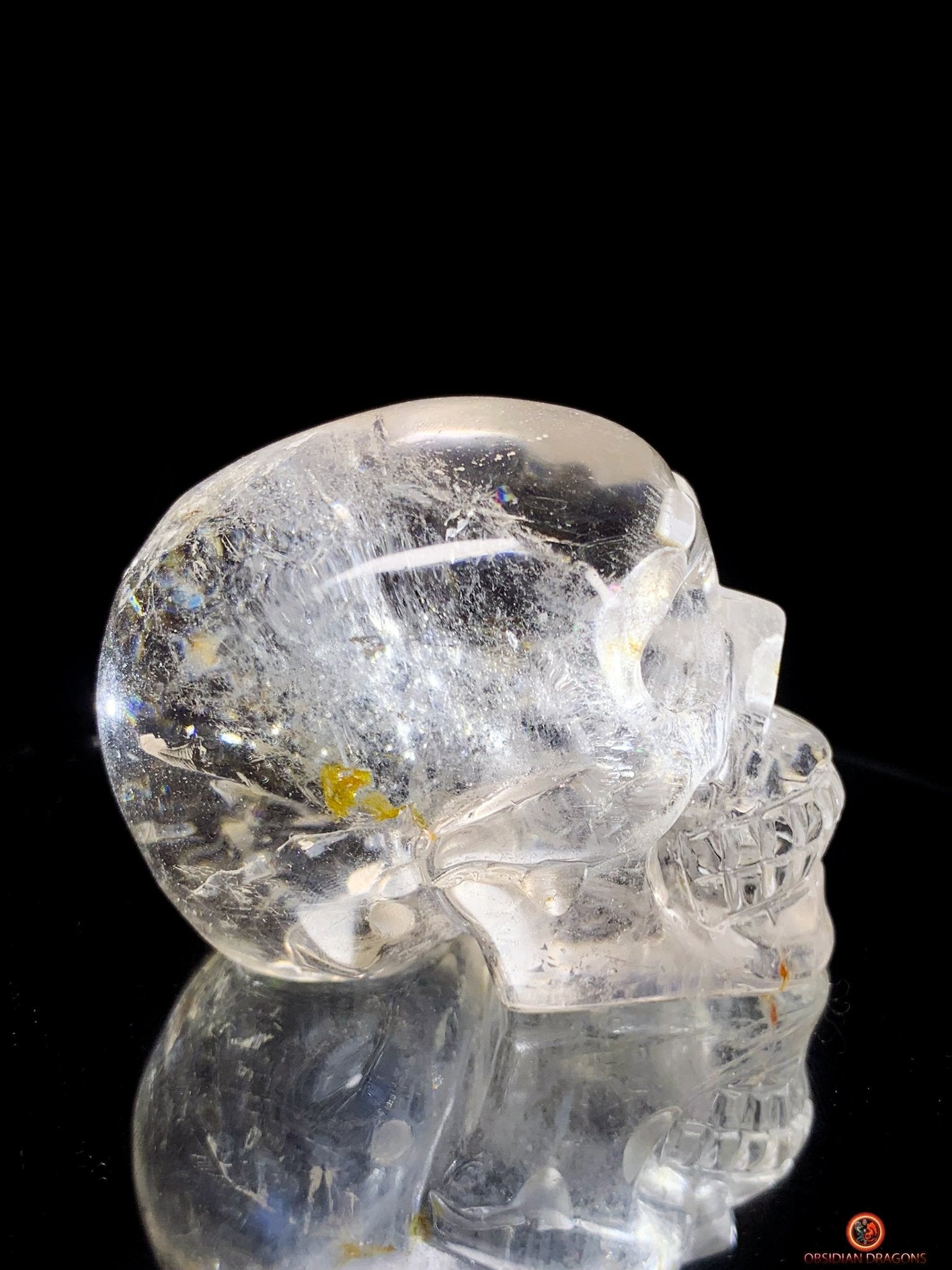 Crâne de Cristal en cristal de roche aux reflets arc-en-ciel | obsidian dragons