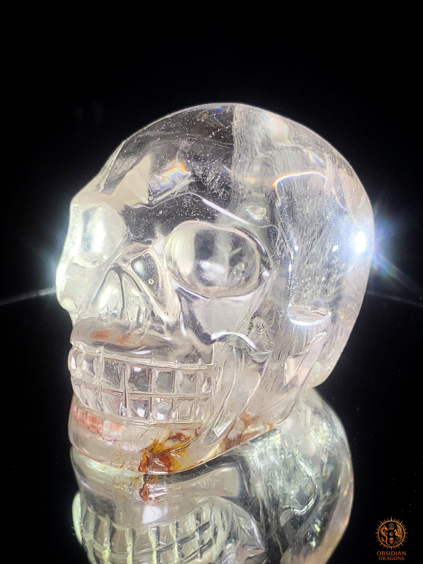 Crâne de Cristal  en cristal de roche - sang de la terre | obsidian dragons