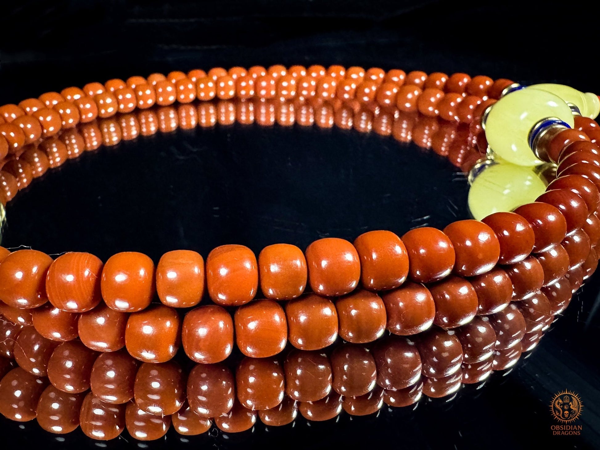 Mala 108 perles en agate Nan Hong de baoshan & ambre royal | obsidian dragons