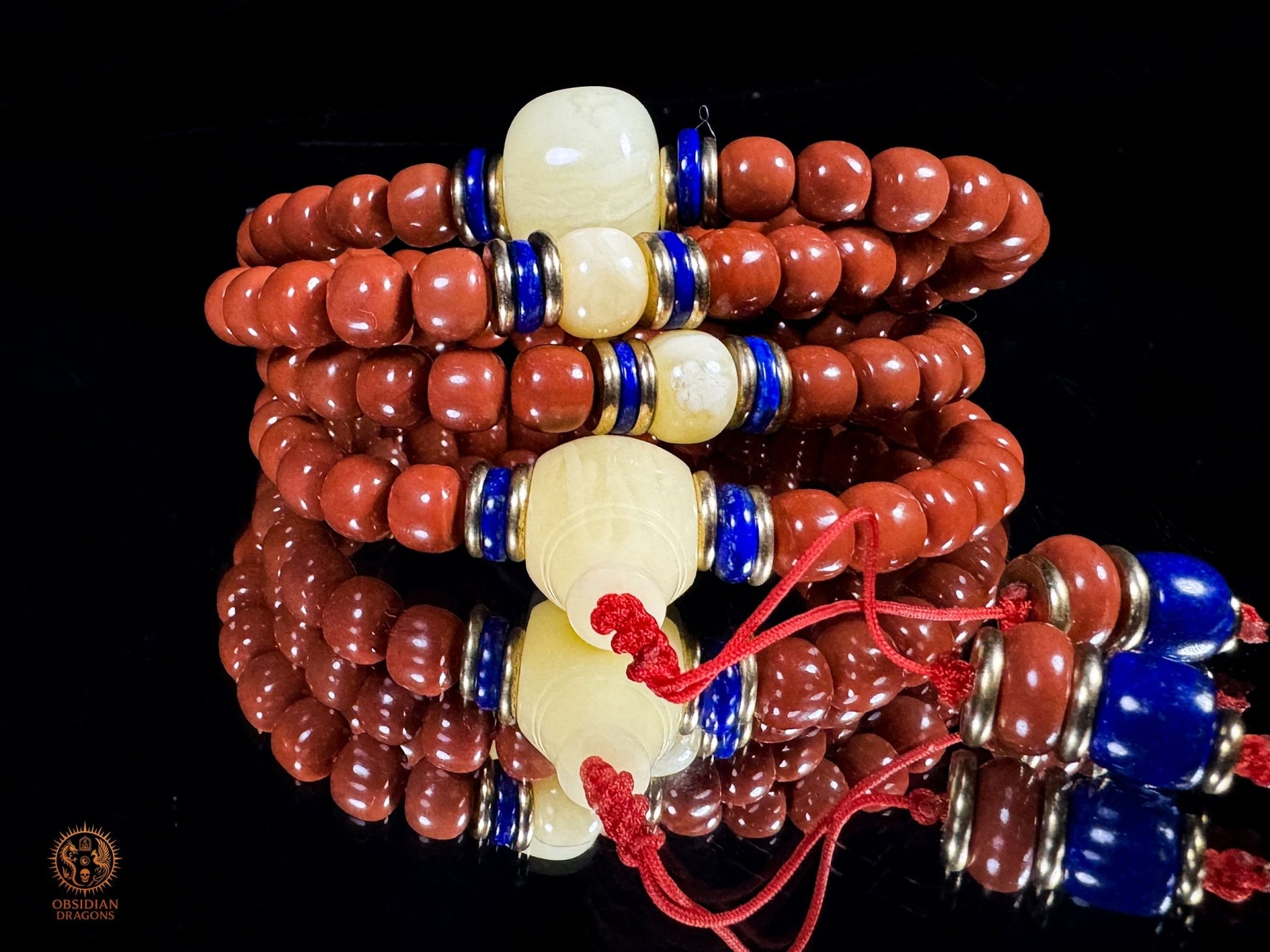 Mala 108 perles en agate Nan Hong de baoshan & ambre royal | obsidian dragons