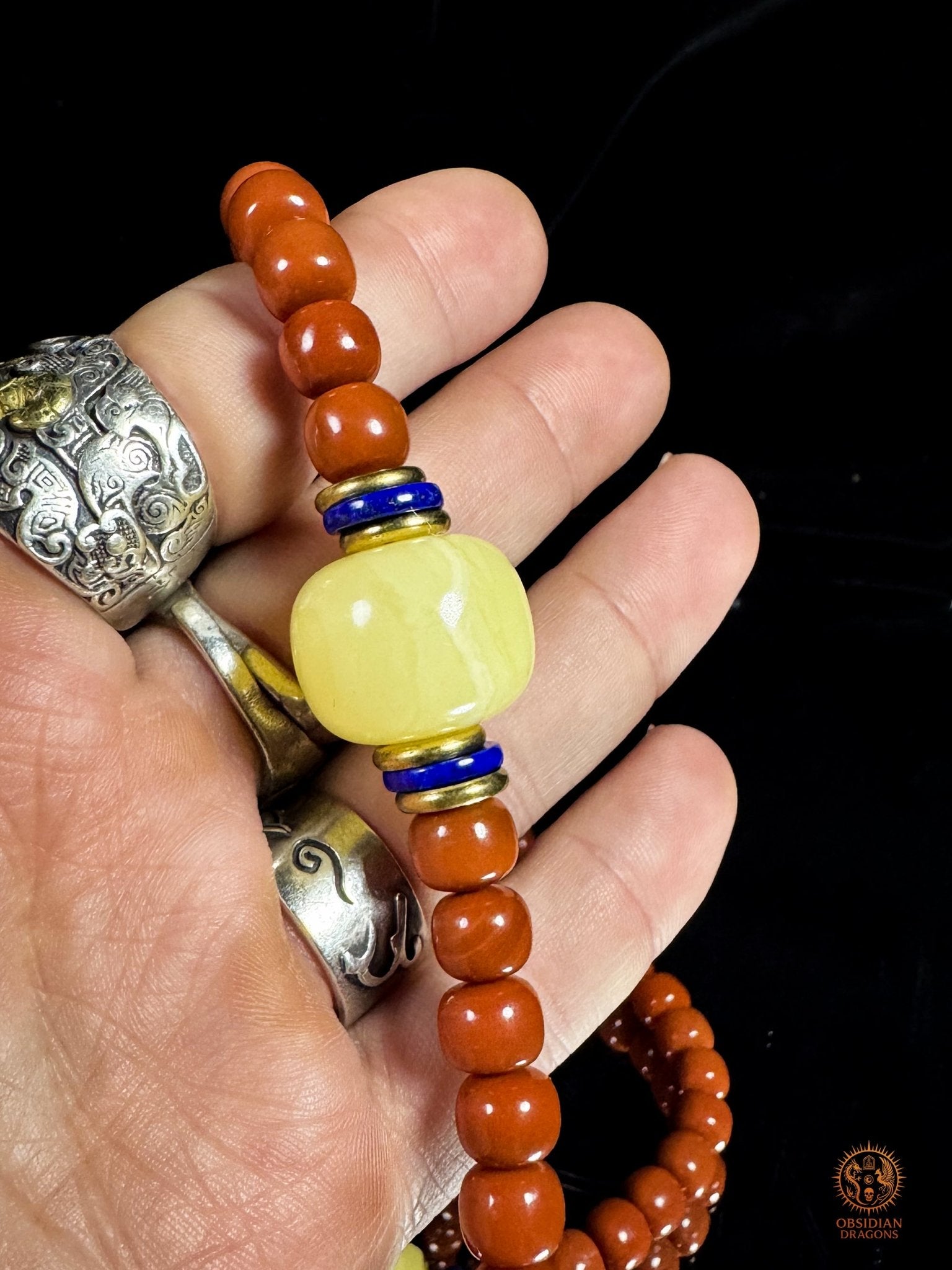 Mala 108 perles en agate Nan Hong de baoshan & ambre royal | obsidian dragons