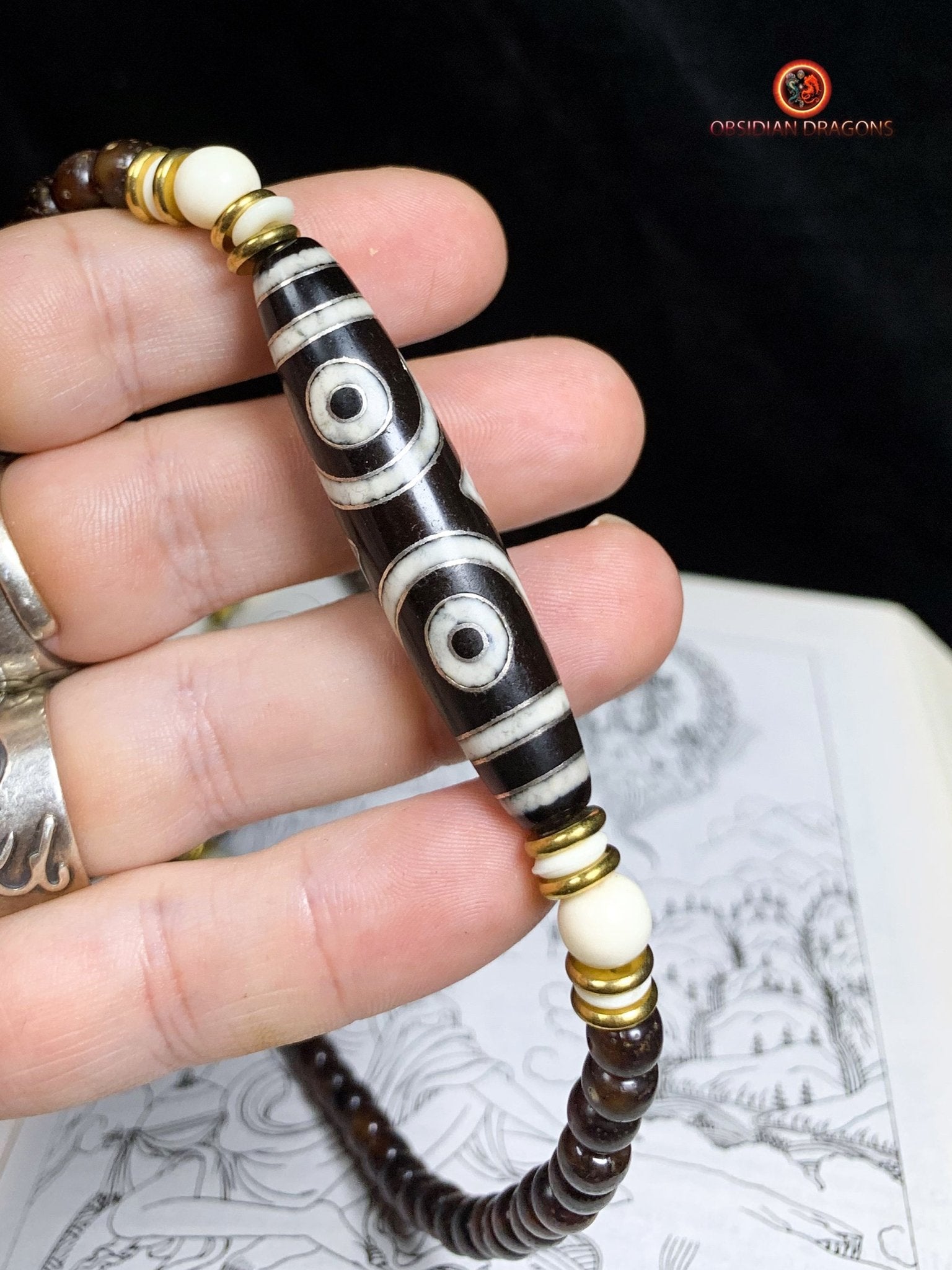 Mala Tibétain en Graines de Bodhi Fossiles - DZI à Trois Yeux | obsidian dragons