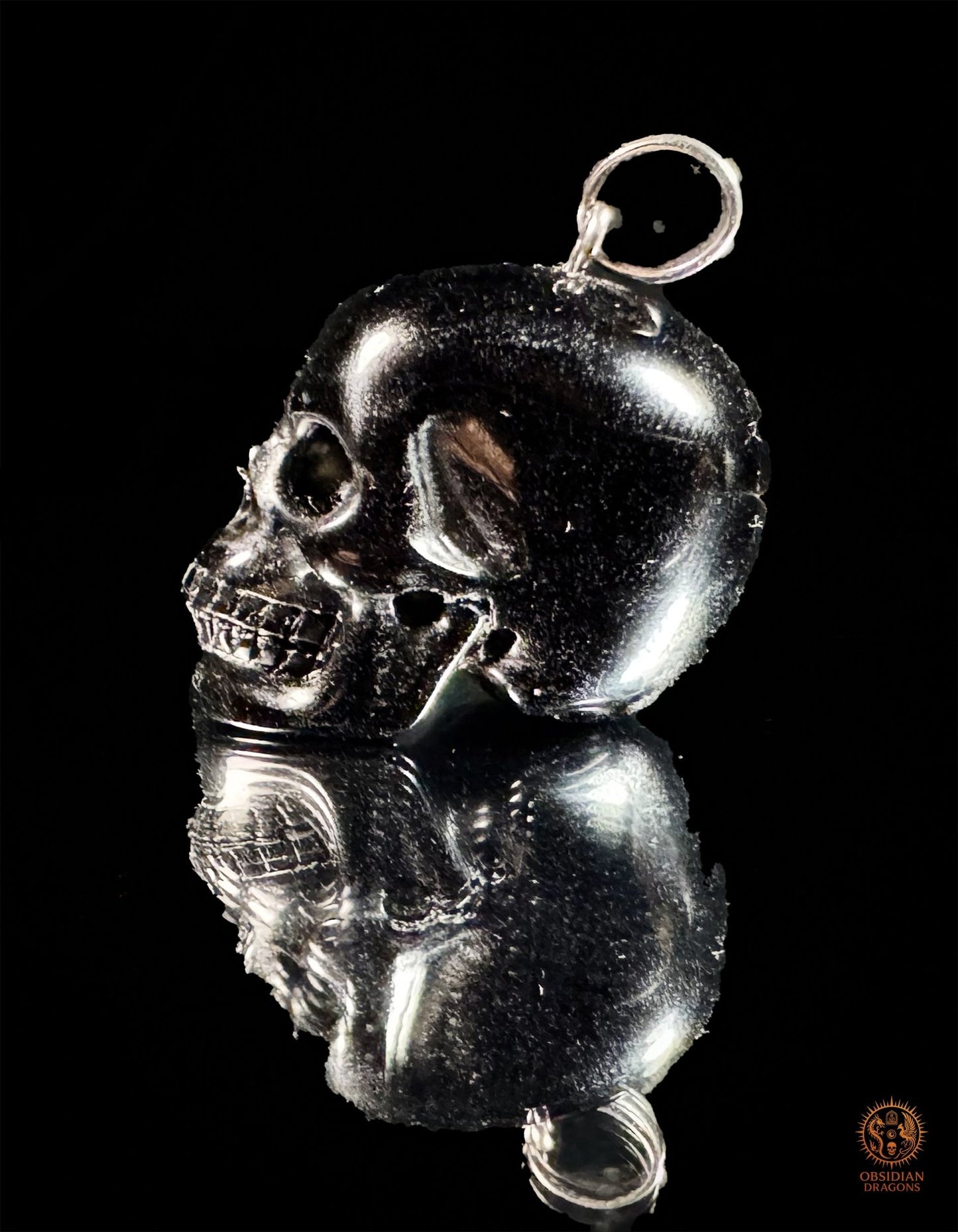 Pendentif crâne en obsidienne noire naturelle | obsidian dragons