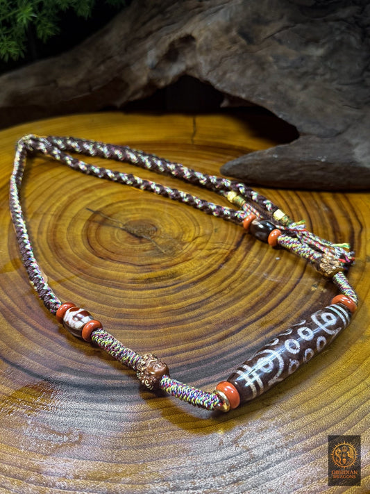 Collier DZI à 21 yeux rare en agate avec Acala en bois de cerf, DZI Lotus, DZI Monseigneur, Nan Hong et tressage artisanal réglable - Obsidian Dragons