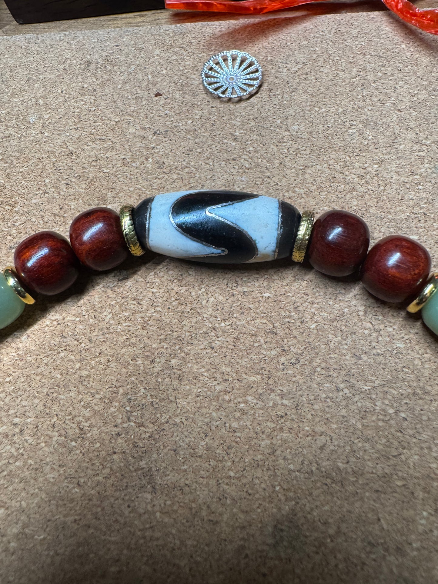 collier dzi pour Anne Sophie - création sur mesure obsidian dragons