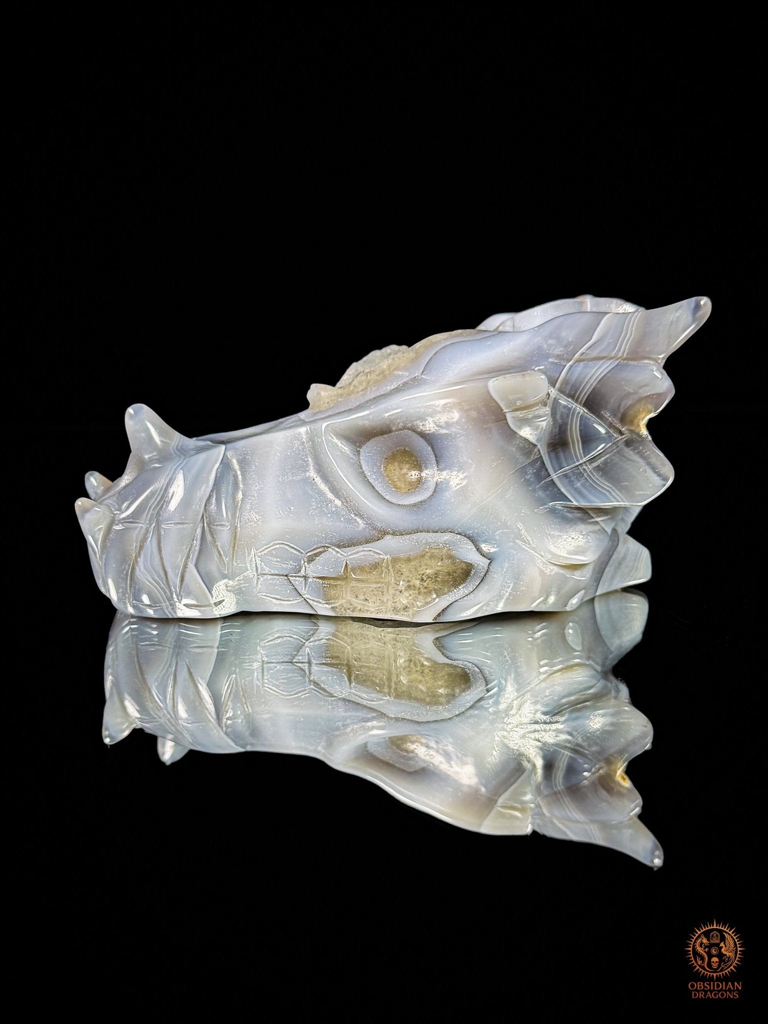 Crâne de dragon en géode de quartz à inclusion de calcite | obsidian dragons