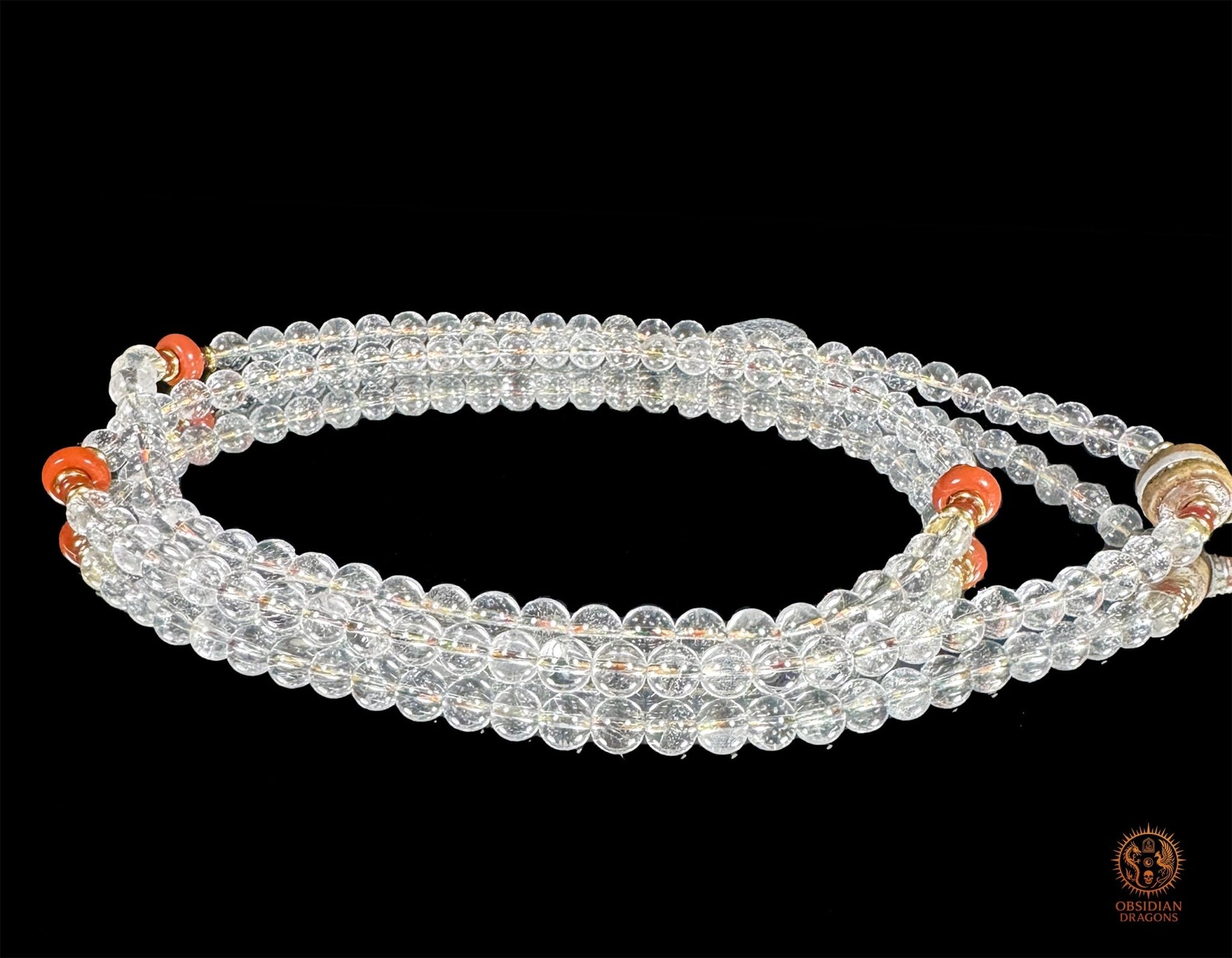 Mala dragon en cristal de roche 108 Perles - Sak Yant - obsidian dragons