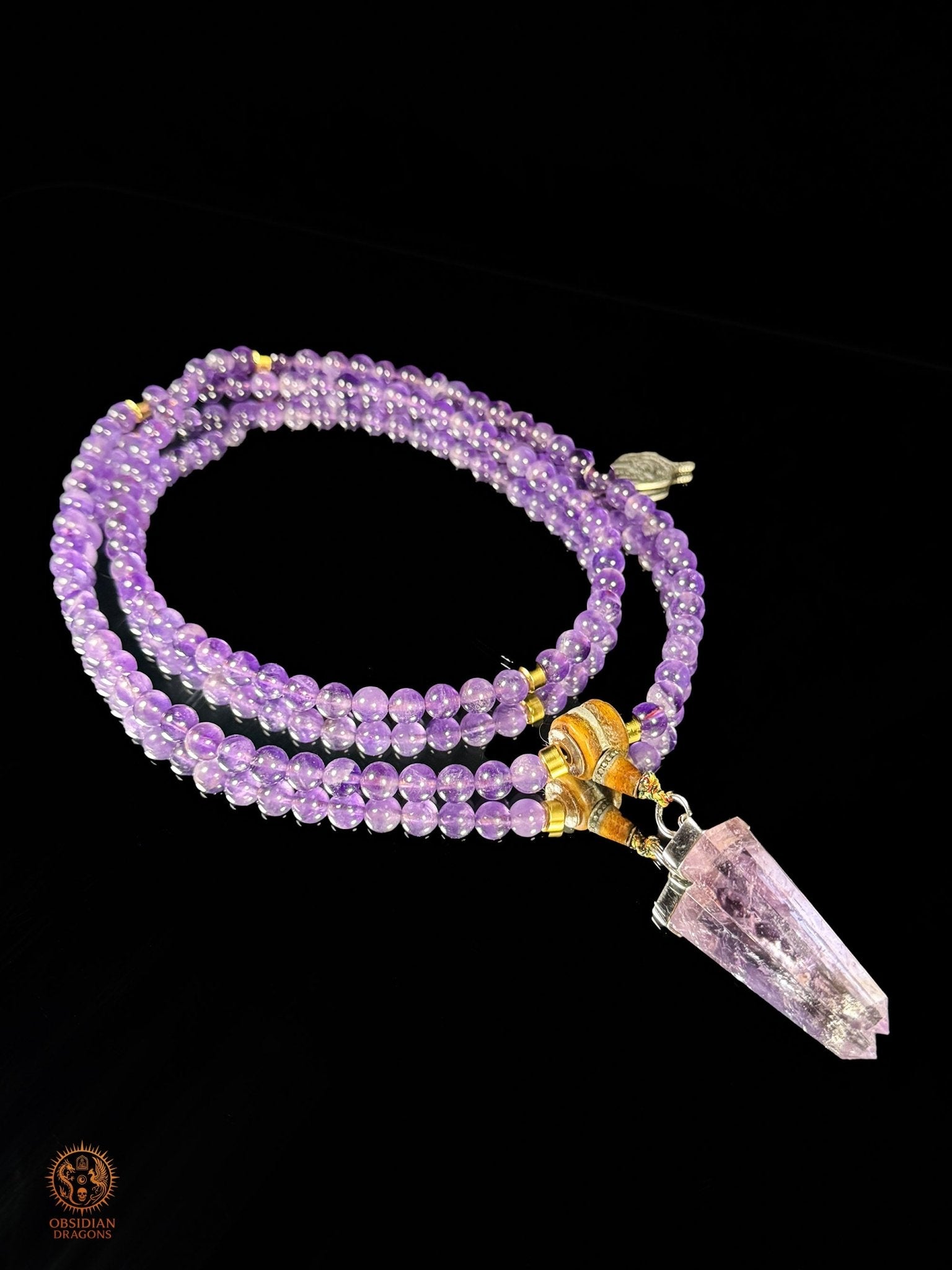 Mala en améthyste 108 perles – pointe amétrine et Sak Yant | obsidian dragons