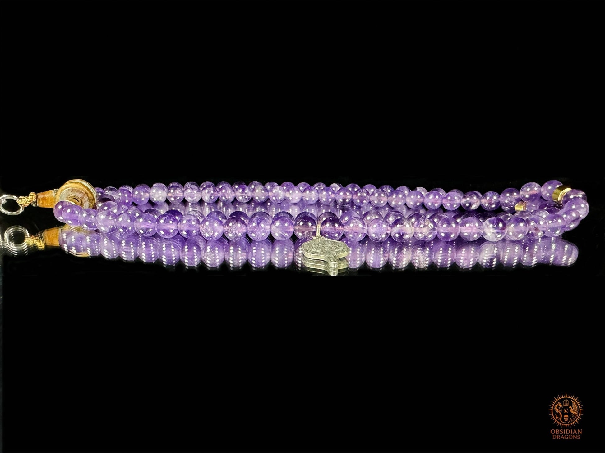 Mala en améthyste 108 perles – pointe amétrine et Sak Yant | obsidian dragons
