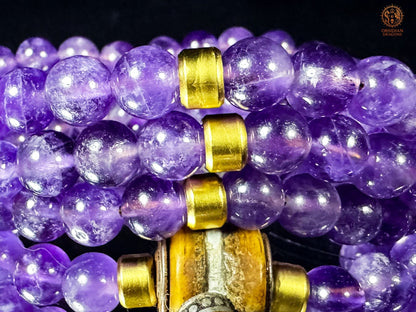 Mala en améthyste 108 perles – pointe amétrine et Sak Yant | obsidian dragons