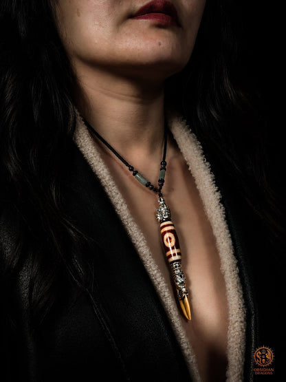 Pendentif DZI à trois yeux serti dans un phurba tibétain - obsidian dragons