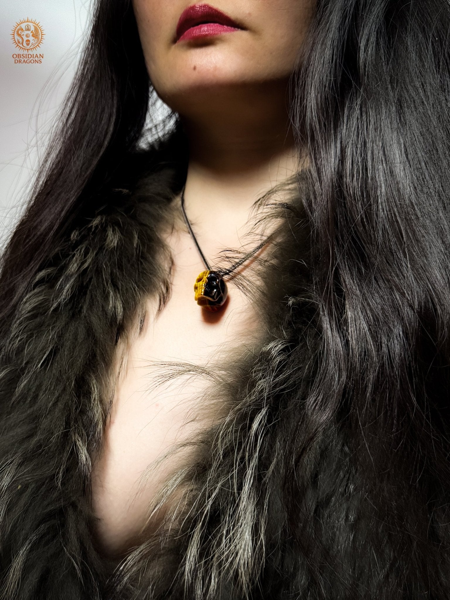 Pendentif crâne en œil de tigre naturel | obsidian dragons