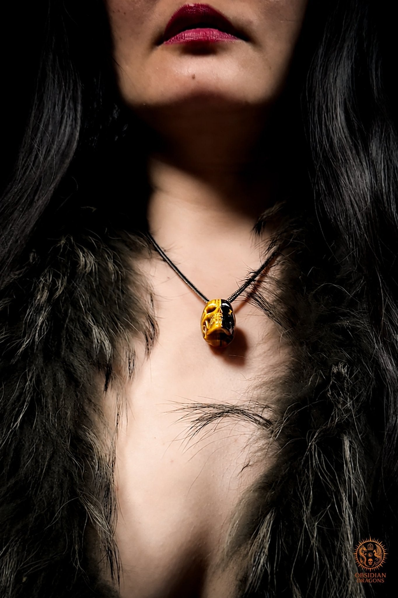 Pendentif crâne en œil de tigre naturel - obsidian dragons
