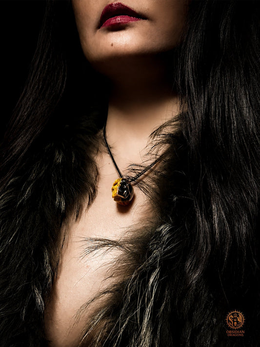 Pendentif crâne en œil de tigre naturel - obsidian dragons