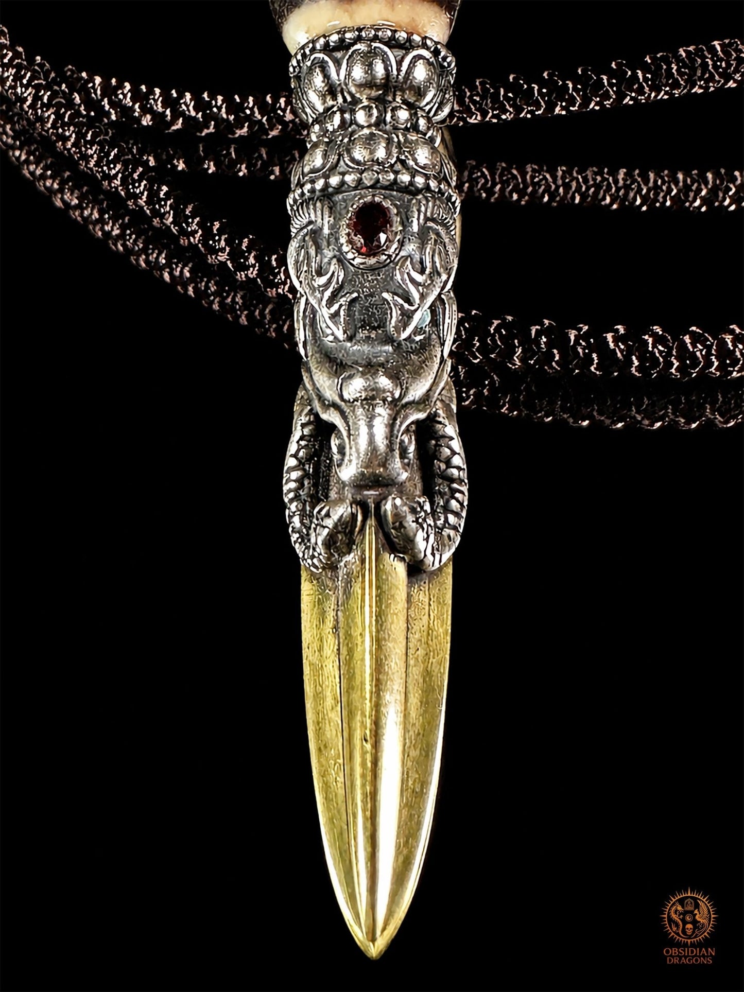 Pendentif DZI du grand homme serti dans un phurba tibétain - obsidian dragons