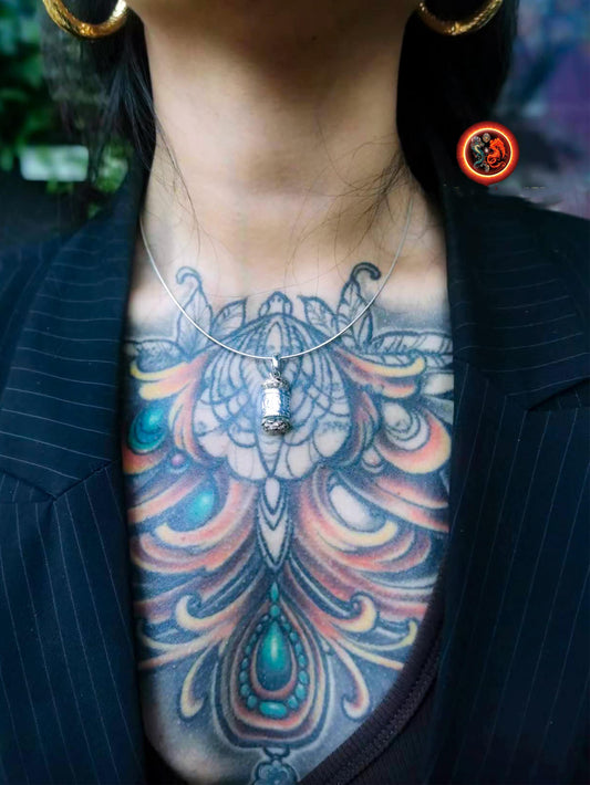 Pendentif bouddha Reliquaire bouddhiste tibetain. Moulin a prière ouvrant. Mantra de la compassion "om mani padme hum". Argent 925 poinçonné, cuivre - obsidian dragon