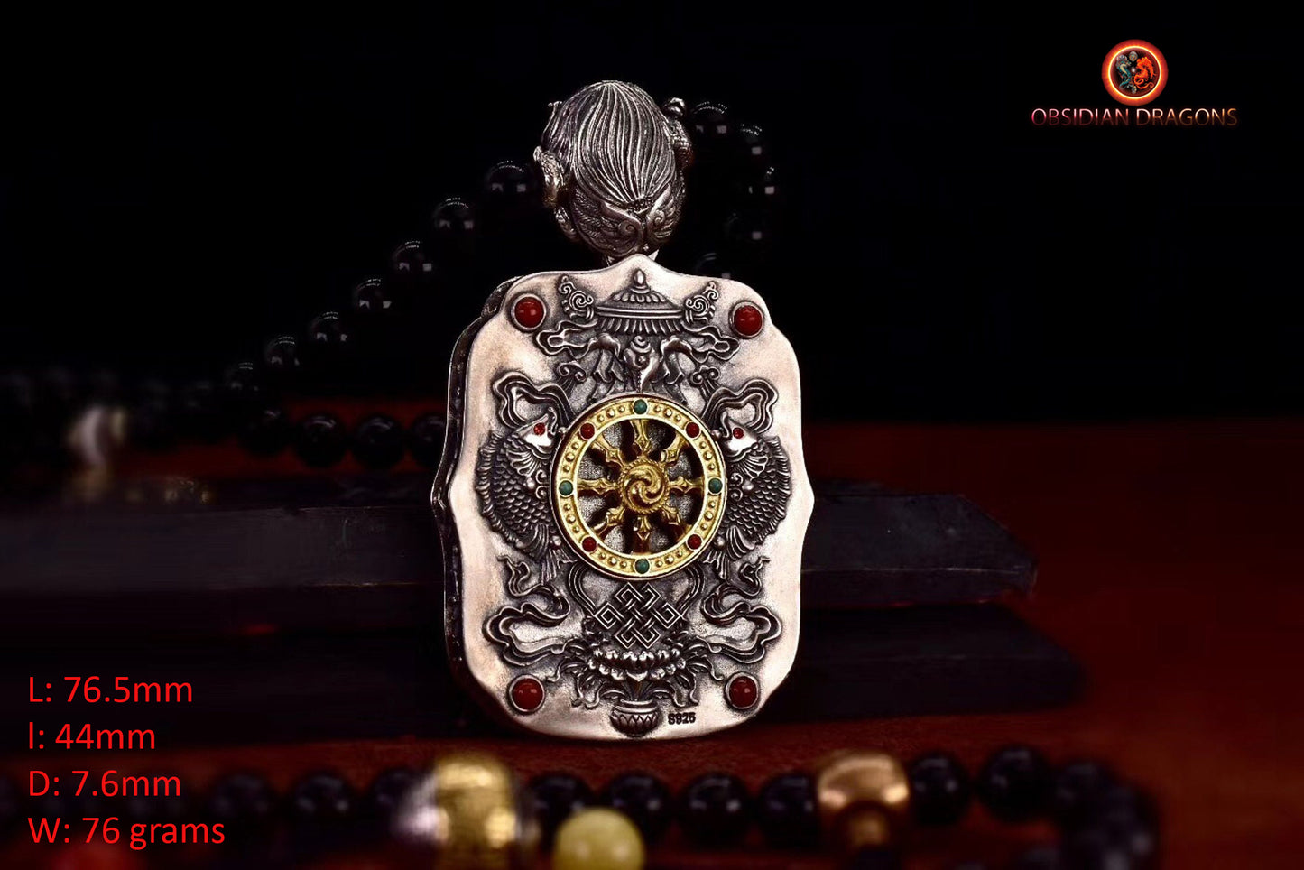 Pendentif Bouddha. Tangka artisanal Jambhala déité de la richesse tibétaine. Bélière Garuda - obsidian dragon