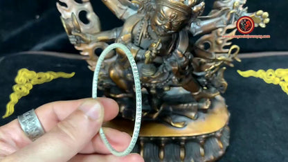 Bracelet jonc bouddhiste sutra du coeur argent 999/1000ème.Sutra gravé à l'extérieur et à l'intérieur du bracelet.