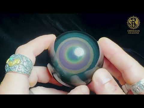 Lien vers la video youtube de la Sphère en obsidienne œil céleste Manta Huichol rare – 6,5 cm - Obsidian Dragons