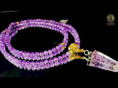 Mala en améthyste 108 perles – pointe amétrine et Sak Yant