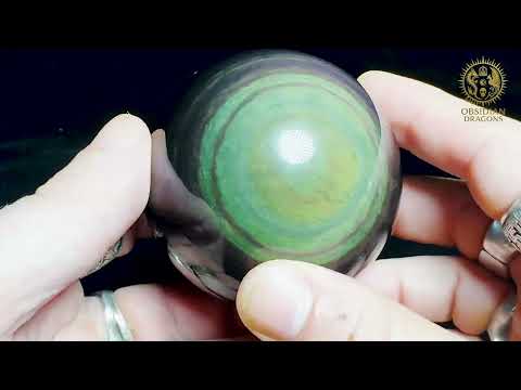Lien youtube vers la video de la Sphère en obsidienne Manta Huichol rare jaune et violet – 7cm - Obsidian Dragons