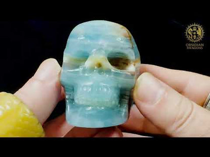 Lien vers la video youtube de Crâne en agate bleue naturelle – Pièce artisanale unique