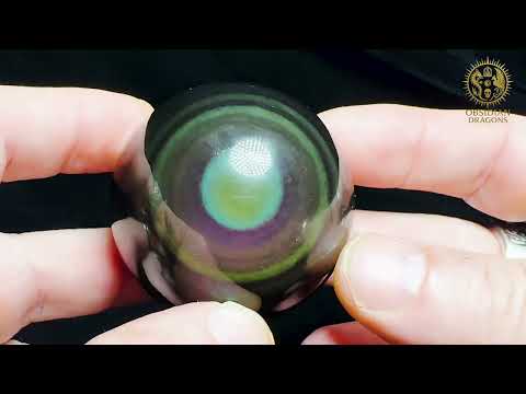 Lien vers la video youtube de la Sphère en obsidienne œil céleste rare violet et mauve – 5,25cm - Obsidian Dragons