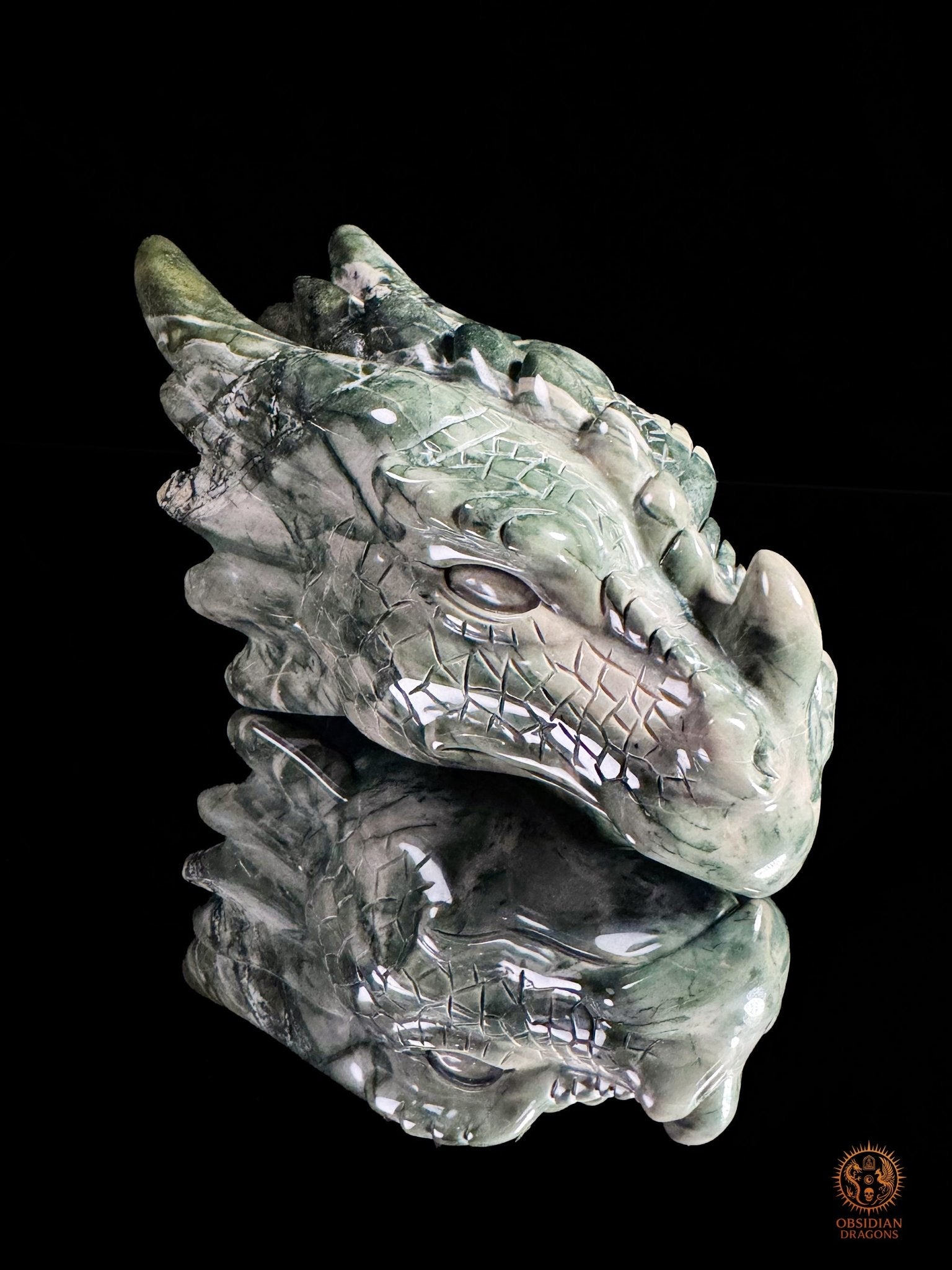 Tête de dragon en jade Hua’an Yu – Ancrage | obsidian dragons
