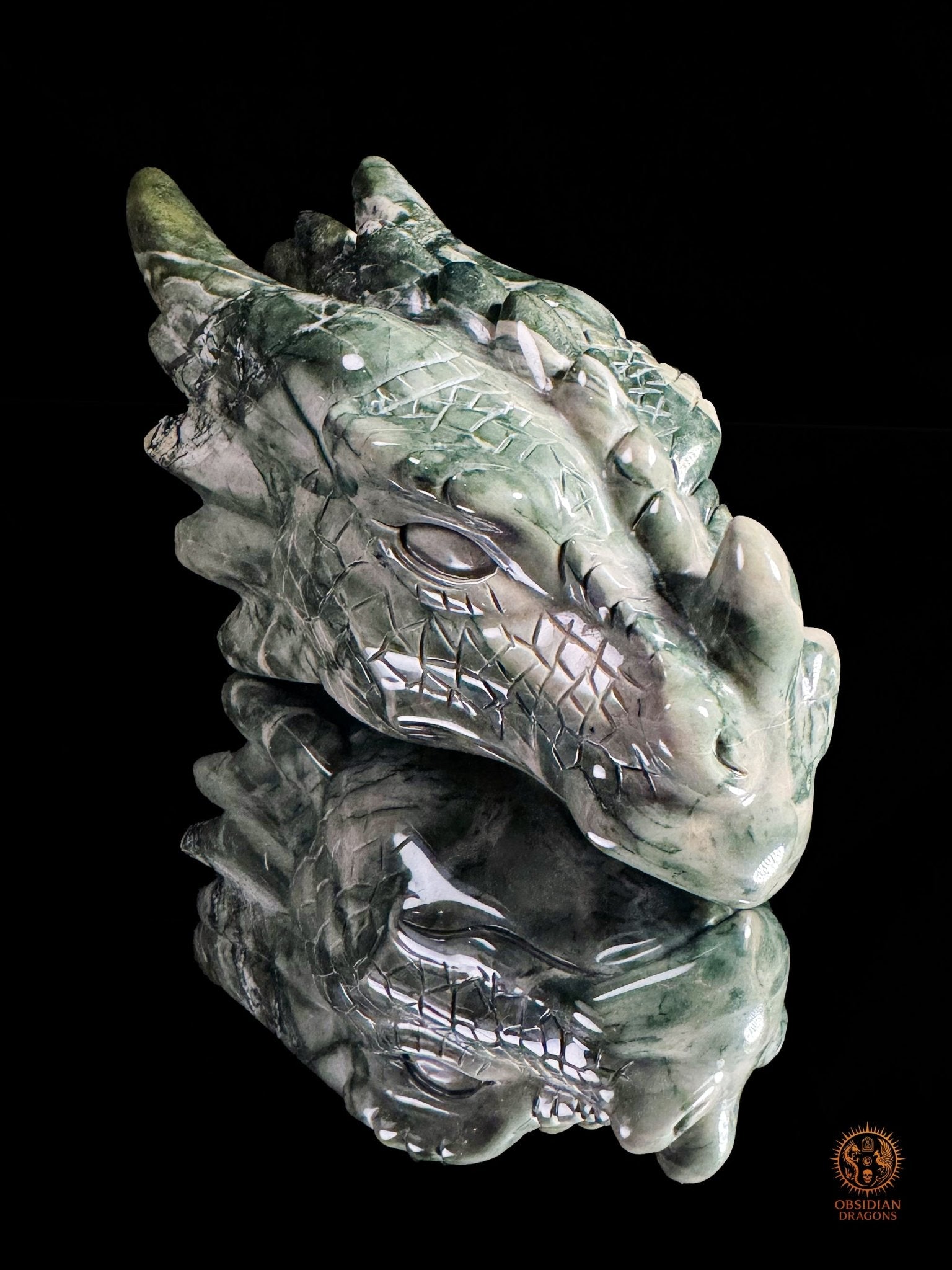 Tête de dragon en jade Hua’an Yu – Ancrage | obsidian dragons