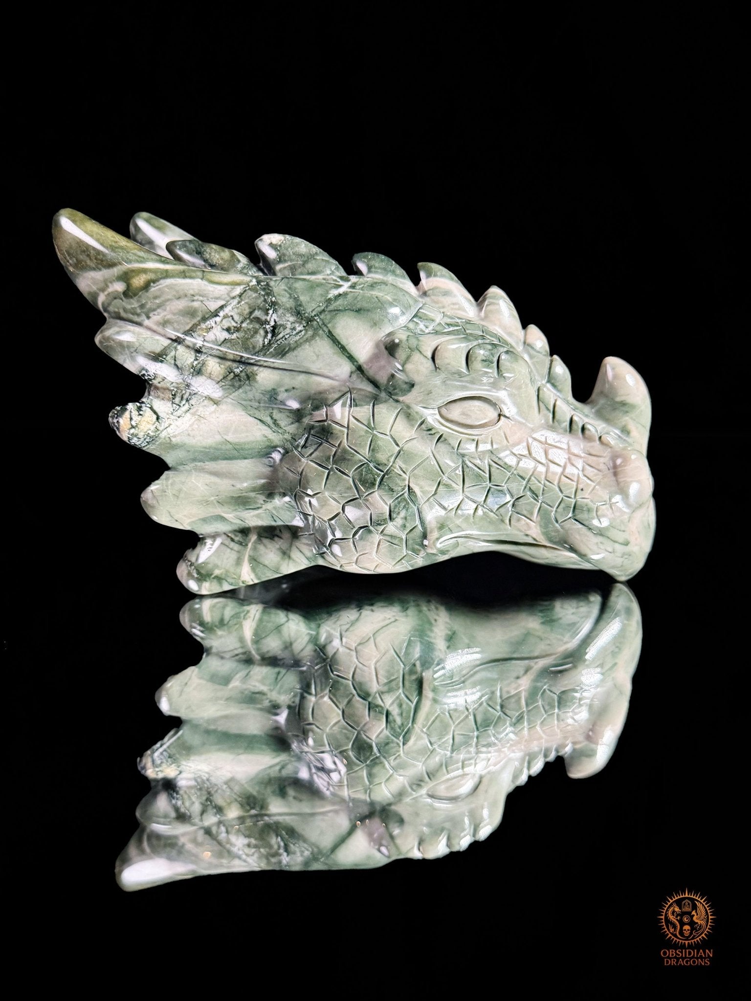 Tête de dragon en jade Hua’an Yu – Ancrage | obsidian dragons