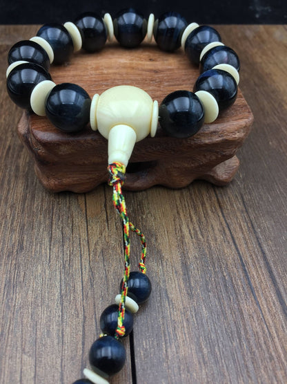 bracelet , mala de poignet chapelet bouddhiste de poignet oeil de faucon de 16mm et ivoire végétal - obsidian dragon